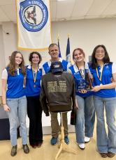 The Camden County NJROTC rifle team won its fifth straight area title last week in Anniston, Ala. Coach Stephen Banta is with Briana Dougherty, Skylar Sanford, Virginia Byrd and Jordan de Jesus. (Submitted photo) 