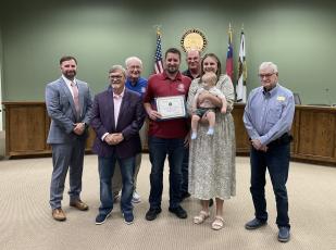 Camden County’s Petie Kemp, center, was honored by the Camden County Board of Commissioners as its employee of the quarter.