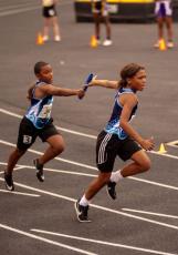 Dijon Green and Cortez Glover compete in the relay. (Submitted photo)