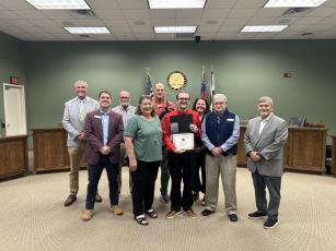 Dennis Irvin, sixth from left, was named the Camden County Board of Commissioners Employee of the Quarter. With Irwin, from left, are County Administrator Joey Yacobacci, Commissioner Cody Smith, Chairman Robbie Cheek, Human Resources generalist Amy Peeples, Commissioner Ben Casey, Dennis Irvin, Interim Deputy County Administrator Shannon Nettles, and Commissioners Jim Goodman and Martin Turner.