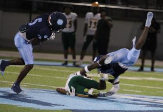 Demetrius Coleman makes the interception after Quan Mercer breaks up a pass. (Andy Diffenderfer, Tribune & Georgian)