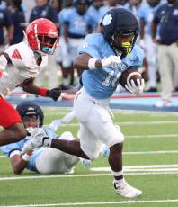 Malakhi Poole breaks free for yardage against Glynn Academy. (Scott J. Bryan, Tribune & Georgian) 