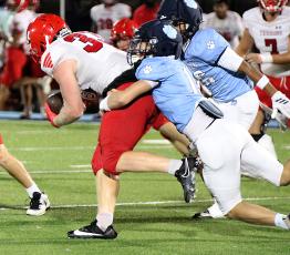 Ryder Whitley makes a tackle last Friday in the Wildcats’ win. Camden visits top-10 Benedictine this week. (Scott J. Bryan, Tribune & Georgian)