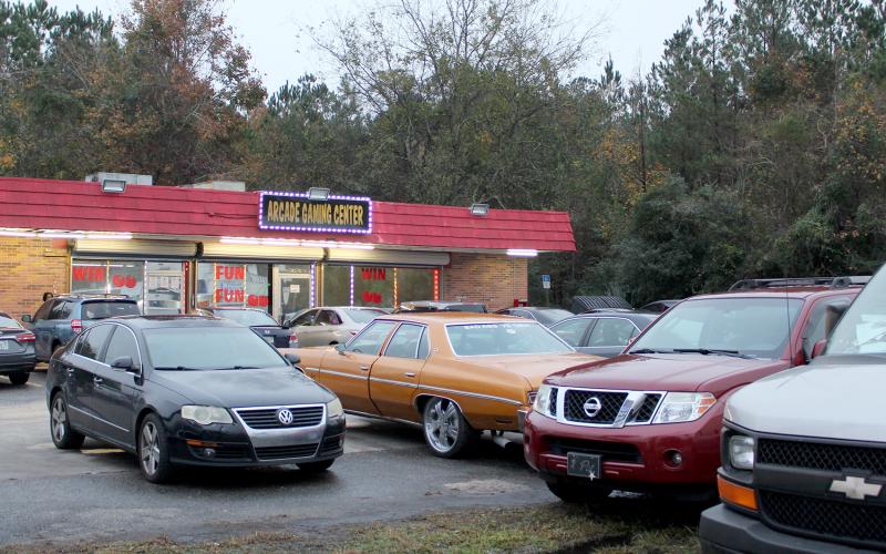 Vehicles fill the parking lot at Arcade Gaming Center in Callahan just after 5 p.m. Friday, also parking in the grass near the traffic lanes of U.S. 1. Adult arcades in Nassau County have nearly doubled in number of establishments since they were shut down in Duval County in October.
