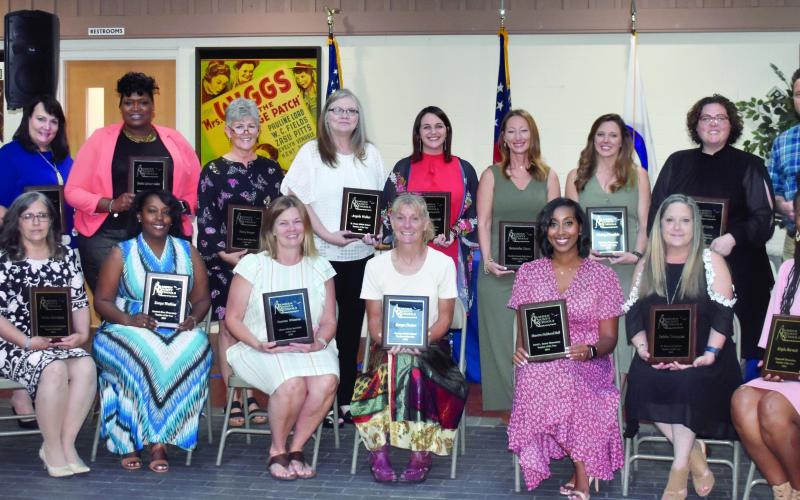 Seated, from left, are Vonice Harrelson, Konya Watkins, Suzanna Whitetree, Karyn Chester, Shantra Hall, Debbie Tennyson, Kayla Burnett; back row, Katherine Dixon, Demaris Cullen, Temika LaFavor-Dallas, Nancy Bowyer, Angela Walker, Danielle Pocernik, Samantha Dixon, Chelsey Dimsdale, Tara Port and Jared Curtis.