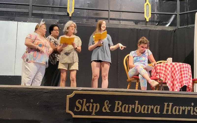 Susan Langenbahn, Brandi Champeau, Tammy Bradley, Kirstin Zipprich and Debra Parsons rehearse for “Southern Fried Funeral.”