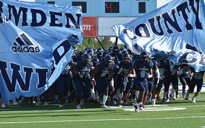 The Wildcats take the field for their Monday scrimmage with Munroe Day. (Andy Diffenderfer, Tribune &amp; Georgian)