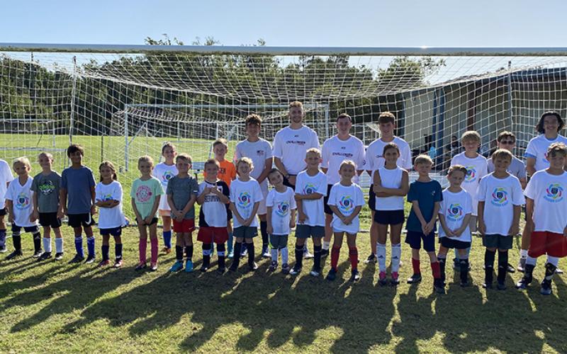 The Camden Soccer Club hosted coaches Daniel Doherty, Harry Summerill and Owen Jury for the Challenger British Soccer Camp last week at the Camden PSA Soccer Complex. (Submitted photo)