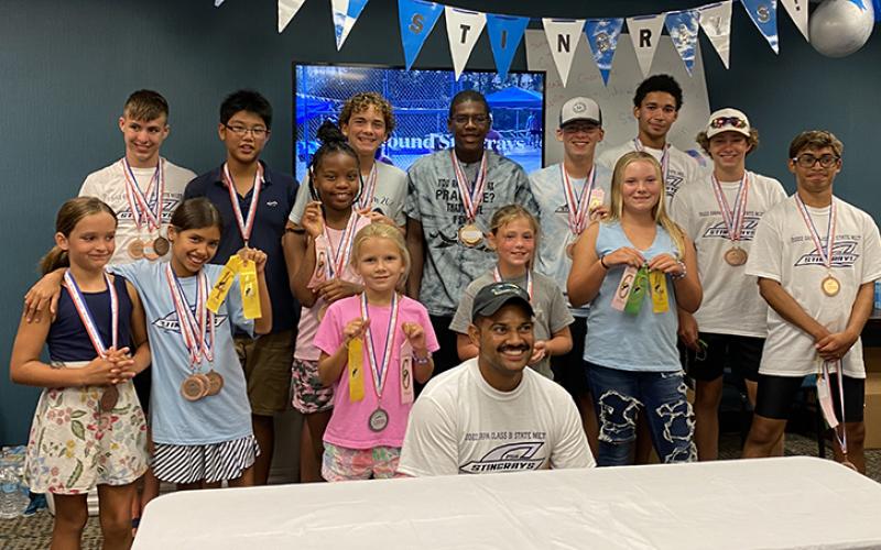 The Camden PSA Stingrays receive their district awards. (Submitted photo)
