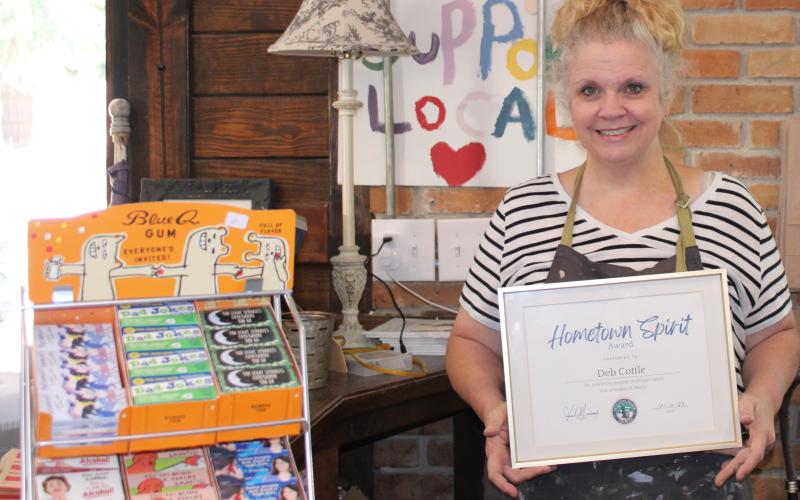 Cottle &amp; Gunn owner Deborah Cottle recently received the city of St. Marys’ Hometown Spirit Award for her commitment to city causes.