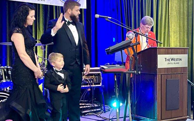 Camden County Commissioner and Readdick Construction CEO Trevor Readdick was recently named president of the Home Builders Association of Georgia. With Readdick is his wife, Nicole Readdick, and son, Frazier.