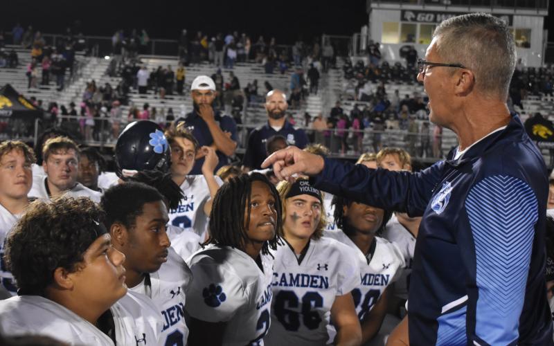 As the Richmond Hill crowd exits last Friday, Camden County head coach Jeff Herron speaks to the Wildcats after their Region 1-7A victory. (Andy Diffenderfer, Tribune &amp; Georgian)