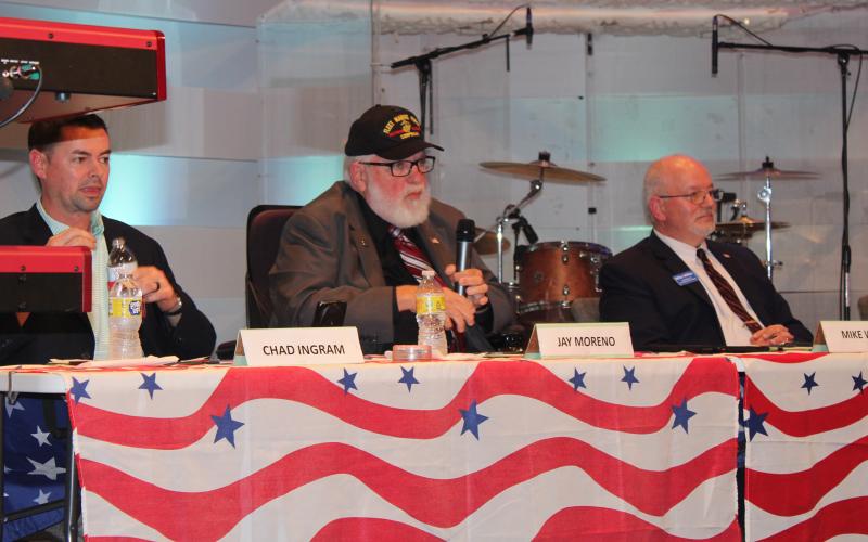 Chad Ingram, from left, Jay Moreno and Mike Wilkie participate in a candidate forum Feb. 23 at Three Rivers Church. The trio are running for St. Marys City Council’s Post 3 seat.