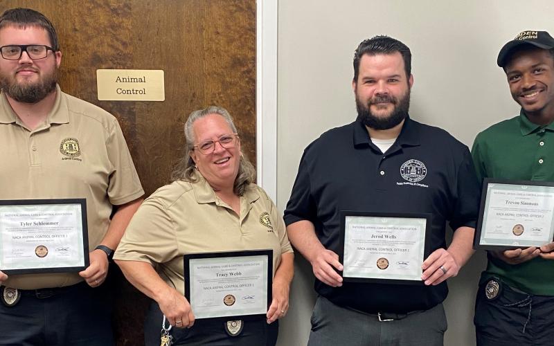 Camden County Board of Commissioners, from left, Animal Control’s Tyler Schlemmer, Tracy Webb, Jerod Wells and Trevyon Simmons recently received certifications from the National Animal Care &amp; Control Association.