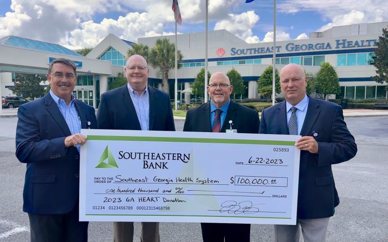 Southeastern Bank recently donated $100,000 to Southeast Georgia Health System’s Camden Campus through the Georgia HEART Hospital Program. From left are Southeastern Bank Senior Vice President Jim Lomis and President and CEO Jay Torbert, Camden Campus Vice President and Administrator Glenn Gan and Southeast Georgia Health System President and CEO Scott Raynes.