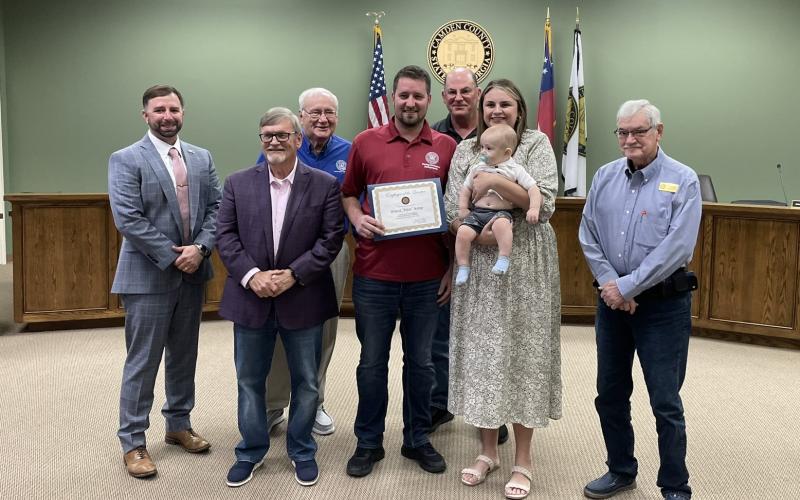 Camden County’s Petie Kemp, center, was honored by the Camden County Board of Commissioners as its employee of the quarter.