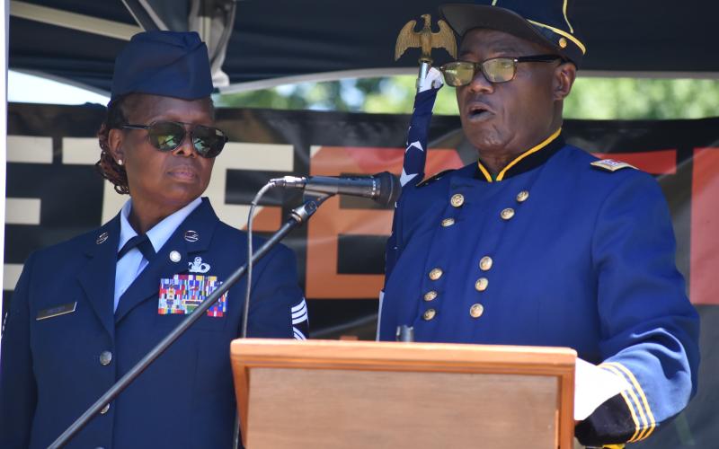 Vernon Higgins, right, accompanied by Michelle Massey, read General Order No. 3, issued June 19, 1865, enforcing the Emancipation Proclamation in Texas.