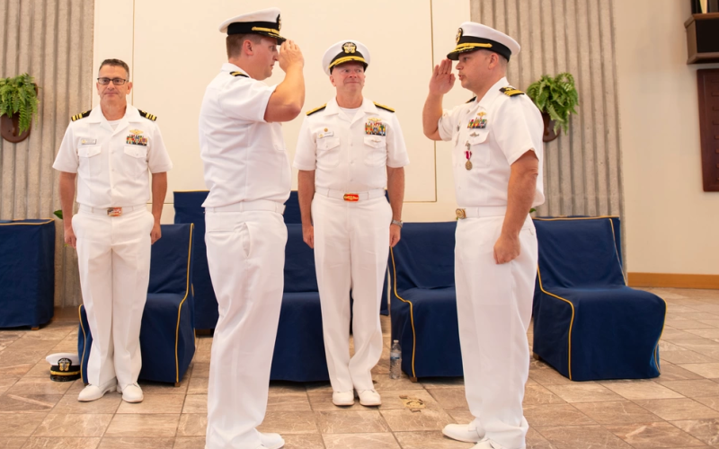 Cmdr. Matt Scovill, right, relinquishes command of Submarine Readiness Squadron 36 (SRS-36) to Cmdr. Matthew Becker on June 14 during a change of command ceremony aboard Naval Submarine Base Kings Bay.