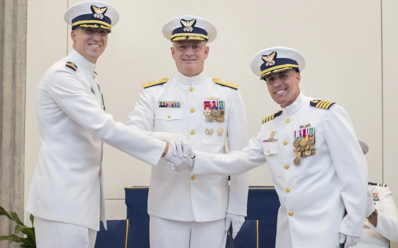 Cmdr. Jeffrey Prebeck assumes command of Coast Guard Maritime Force Protection Unit Kings Bay from Capt. David Vicks during a change of command ceremony July 11 in St. Marys. Rear Adm. Douglas Schofield, commander, Coast Guard Seventh District, presided over the ceremony.