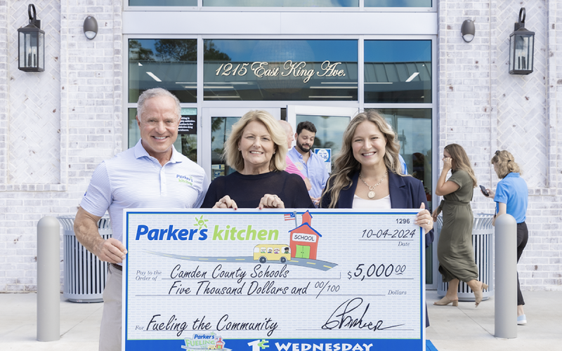 In below photo, Parker’s Kitchen made an inaugural $5,000 Fueling the Community donation to Camden County Schools on Oct. 4. Camden County Schools Executive Director of Finance Jennifer Brown, center, accepted the donation from Parker’s Kitchen founder and CEO Greg Parker, left, and Parker’s Kitchen Outreach and Communications Manager Olivia Parker on behalf of local teachers and students.