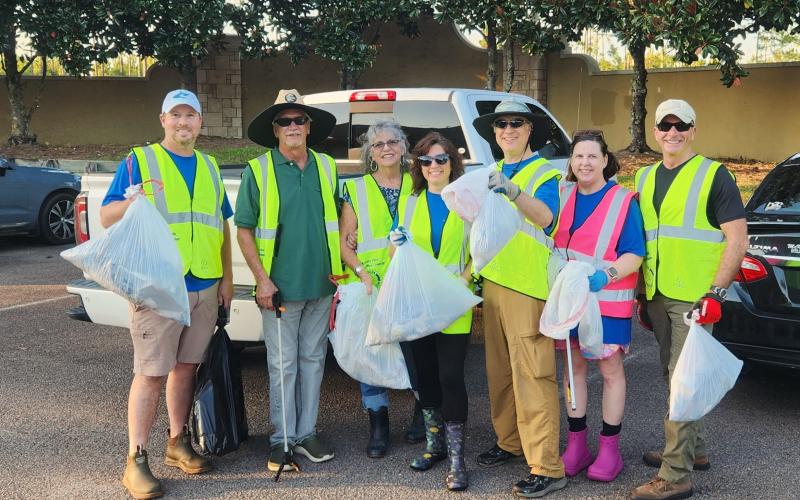 Rotary Club of Camden County members Brad Morris, Fred Parvey, Wannelle Parvey, Amanda Blyler, Erik Nesteruk, Kim Nesteruk and Scott Coyle were part of a roadside cleanup team recently.