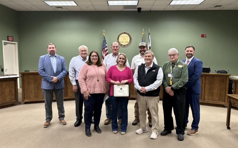 Summer Sullivan, center, was awarded the Employee of the Quarter for her work in the Camden County Tax Assessors Office.
