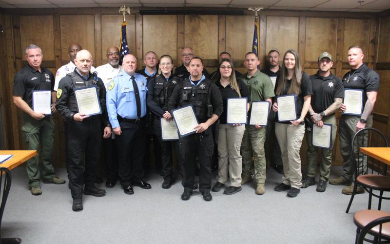 ABOVE: Camden County Sheriff Kevin Chaney recognized Camden County Sheriff’s Office employees and area agencies for their contribution during an active-shooter event Jan. 8. BELOW: Chaney awards deputy Dakota Todd her certificate. To view more photos from the event, visit the Tribune &amp; Georgian’s Facebook page.