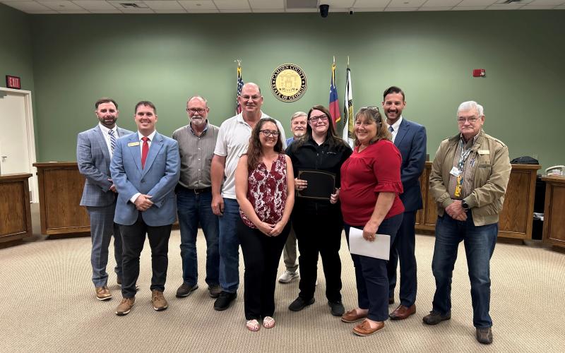 The Camden County Board of Commissioners Information Technology Department’s Kayla Oliver was recently honored as the entity’s Employee of the Quarter. From left are County Administrator Shawn Boatright, Commissioners Cody Smith and Robbie Cheek, Chairman Ben Casey, Employee Recognition Member Krystin Miller, Commissioner Martin Turner, Employee Recognition Committee Member Amy Peeples, Deputy County Administrator Seth Collins and Commissioner Jim Goodman.