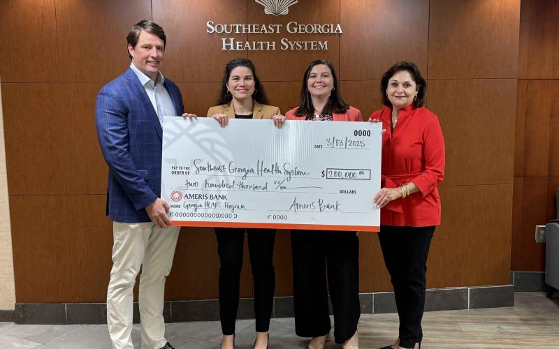 Ameris Bank Market President J. Brad Danowski, from left, Southeast Georgia Health System Interim President and CEO/Chief Legal Officer Christy Jordan, Ameris Bank Assistant Vice President/Branch Manager Shannon Yonce and Ameris Bank Senior Vice President of Commercial Lending Donna Gowen Poe celebrate a $200,000 Georgia HEART contribution to the hospital.