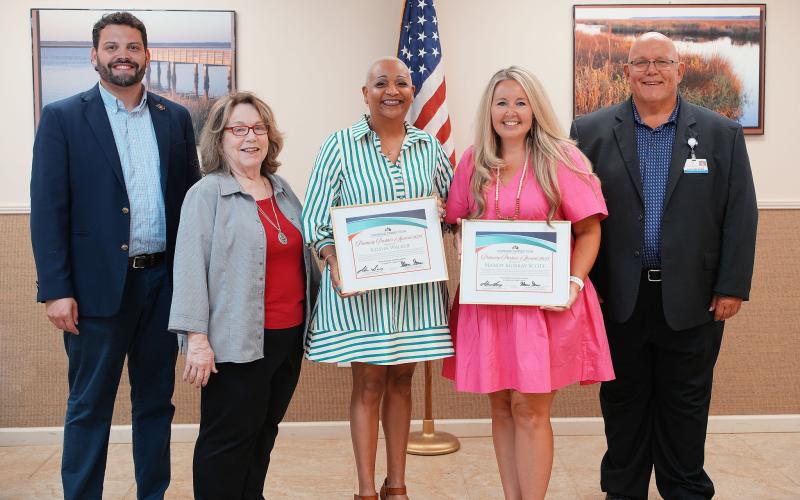 Camden County High School Guidance Director Keisha Walker and ninth-grade counselor Mandy Murray Scott received Camden Connection’s Prevention Partner Awards. From left are Camden Connection Managing Principal Steven Sainz, Walker, Camden Connection board member Rachel Baldwin, Walker, Scott and Camden Connection Board President Glenn Gann.