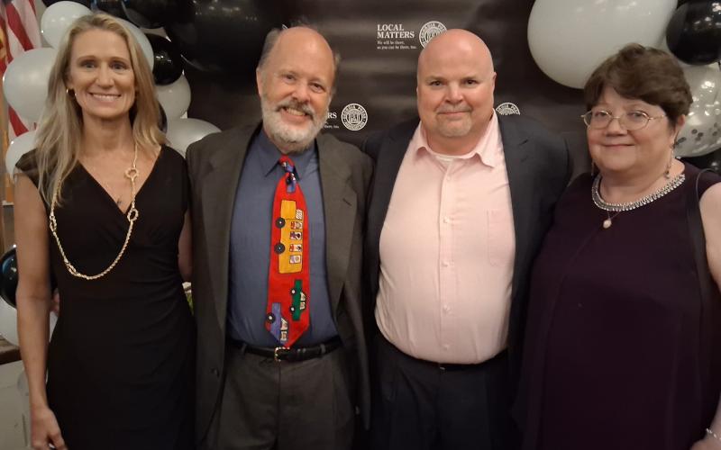 The Tribune &amp; Georgian won eight awards at the Georgia Press Association’s Better Newspaper Contest banquet. From left are Marketing Director Laurie Levine, Assistant/Sports Editor Andy Diffenderfer, Editor and Publisher Scott J. Bryan and Production Director Denese Proctor.
