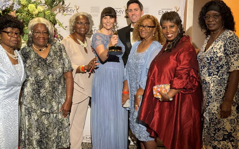 “The Day That Shook Georgia,” a documentary about the Thiokol Plant explosion in 1971, recently won a Southeast Emmy. From left are Thiokol Memorial Project’s Beatrice Hall, Emma Lou Gibbs, Angela Myers, executive producer Anne Longstreth, director Patrick Longstreth, and Thiokol Memorial Project’s Hattie Fogle, Melissa Jackson and Henrietta Lee.