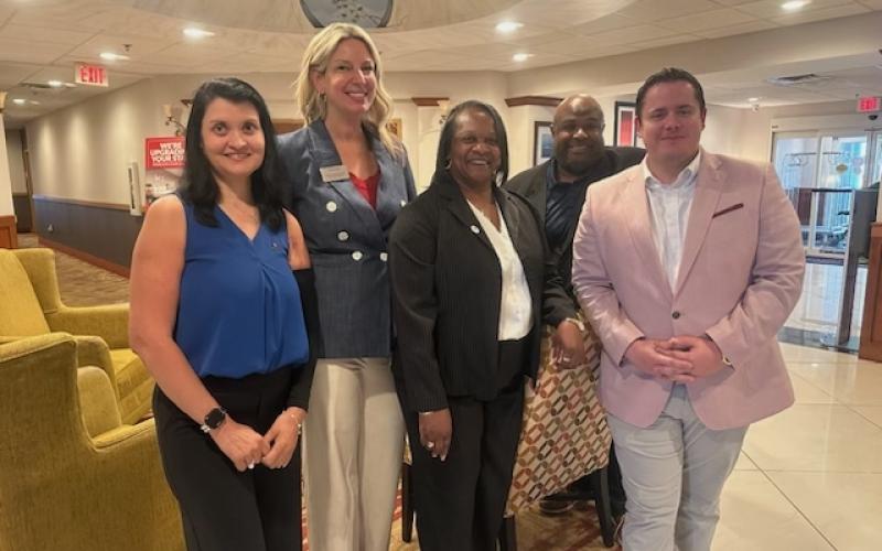 Hawthorn Extended Stay and Wingate by Wyndham General Manager Lola Goettie, center, recently received the Community Service Award from the hotel chain. From left are Luminous Hotel Management CEO Neha Jadhav, Wyndham’s Stephanie Shaw, Goettie, Wyndham’s Sean Wiggins, and Luminous Hotel Management COO James Fair.