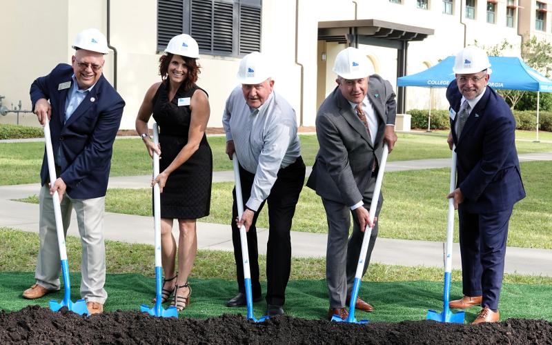 From left, state Rep. Rick Townsend, Dean of the School of Nursing and Health Sciences Lydia Watkins, University System of Georgia Chancellor Sonny Perdue, College of Coastal Georgia President Johnny L. Evans Jr. and Vice President of Advancement Jamie Bessette break ground on the expansion to Miriam and Hugh Nunnally Hall.