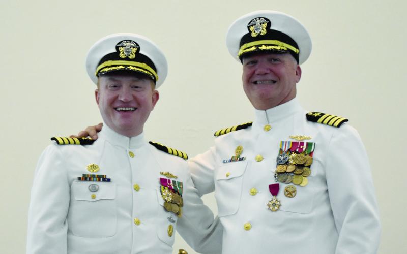 U.S. Navy Capt. Bill Dull, left, replaces Capt. Chris Bohner as commanding officer at Kings Bay Naval Submarine Base.