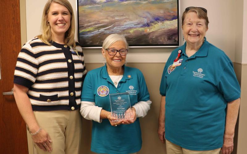 Terri Capps, center, was named the Southeast Regional Health System Camden Campus Volunteer of the Year. With Capps is Service Excellence Vice President Stephanie Stark, left, and Camden Campus Volunteer Services President Kathleen Worthing.