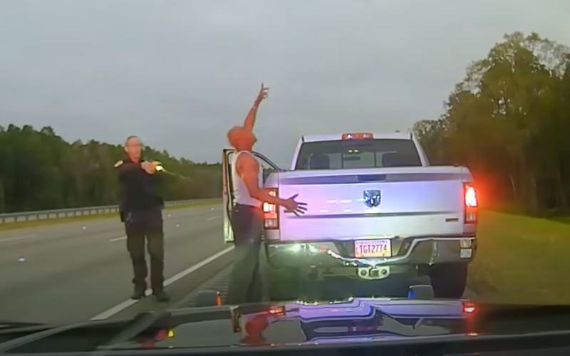 Camden County Sheriff’s Office Sgt. Buck Aldridge, left, deploys a Taser at Leonard Allan Cure during a traffic stop Oct. 16, 2023. Aldridge later shot and killed Cure when the two fought during the incident.