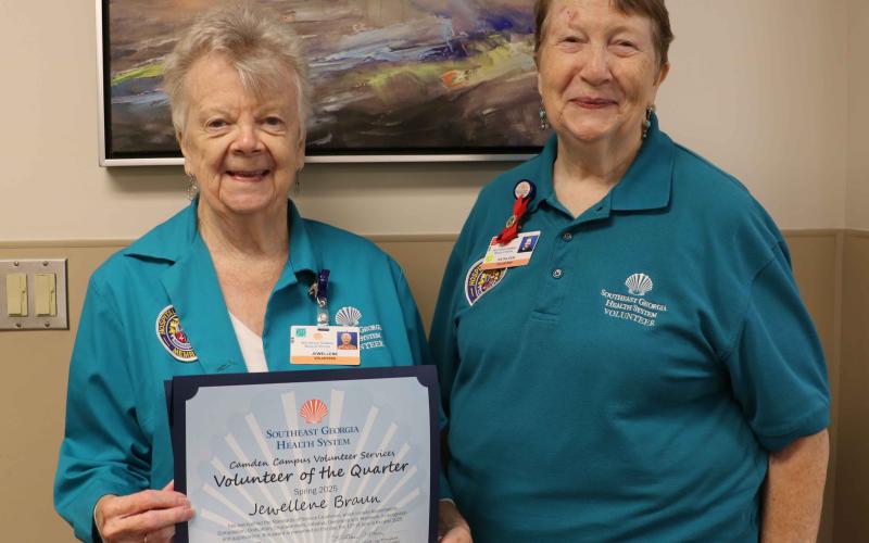 Southeast Georgia Health System Camden Campus Volunteer Services President Kathleen Worthing, right, honors Spring Volunteer of the Quarter Jewellene Braun.