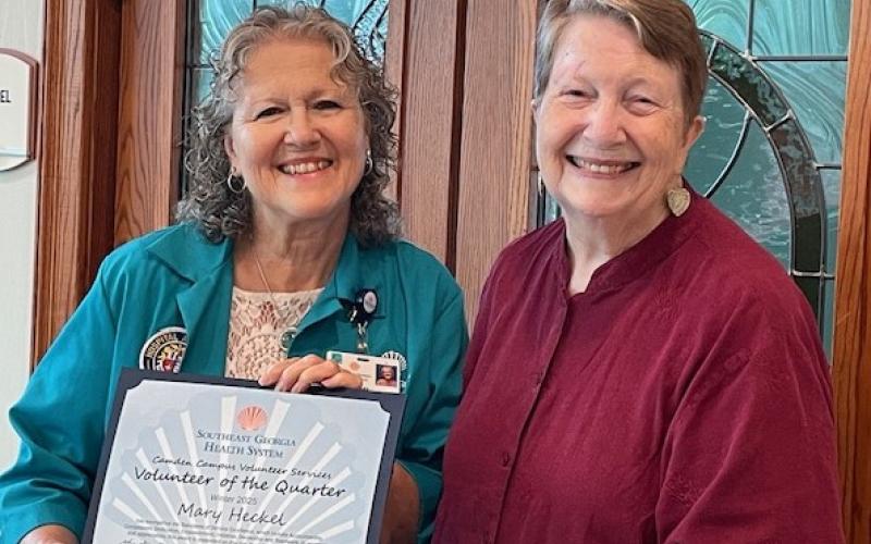 Southeast Georgia Health System Camden Campus Volunteer Services President Kathleen Worthing, right, honors Winter Volunteer of the Quarter Mary Heckel.