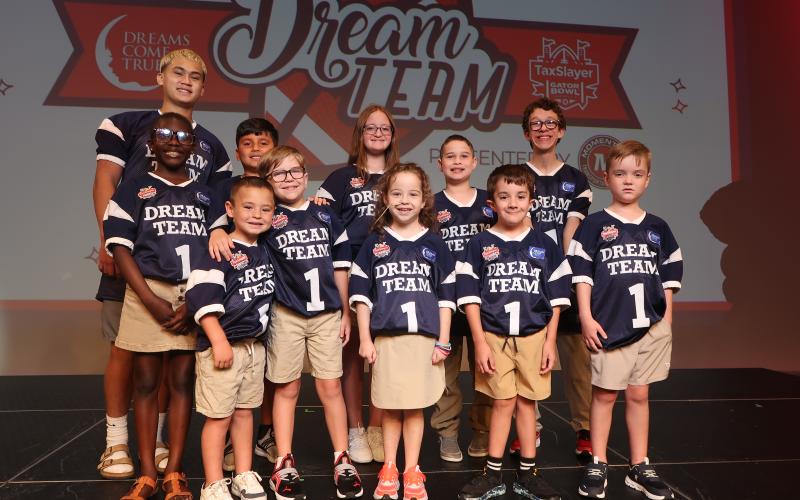 The Gator Bowl Dream Team features 12 children, including two from St. Marys.