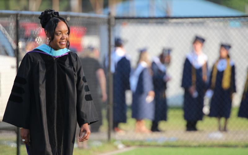 Camden County Schools Superintendent Tracolya Green prepares to walk onto the stage in May prior to the Camden County High School graduation ceremony.