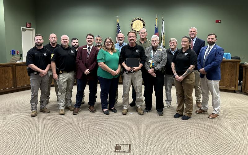 Camden County Sheriff’s Office Investigator Richard Daley, center, was named to the county’s Employee of the Quarter.