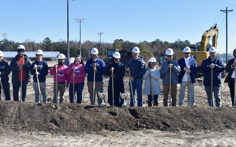 Camden County Schools leaders and other officials break ground on the Camden County High School Ninth Grade Center extension.
