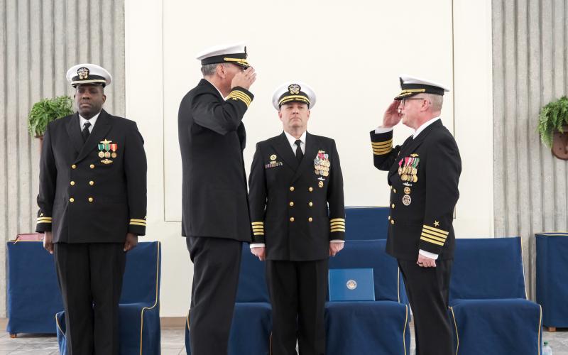 Capt. Bradley Bozin, left, incoming commanding officer at Trident Training Facility Kings Bay; Capt. Matthew Fanning, center, commanding officer, Submarine Learning Center and presiding officer; and Capt. Brian Turney, outgoing commanding officer of Trident Training Facility Kings Bay, participated March 12 in a change-of-command ceremony at Naval Submarine Base Kings Bay.