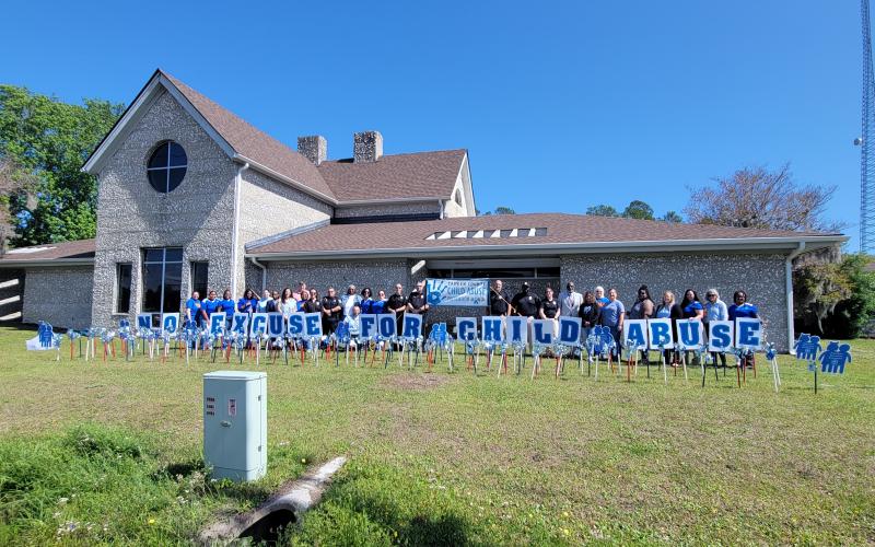 Representatives from local partner agencies gathered at the Camden County Public Library in Kingsland to plant pinwheels in recognition of Child Abuse Prevention Month and the importance of supporting children and families.