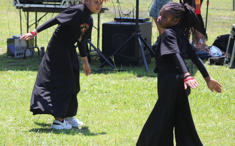 Jhianna Patterson and Autumn Fizer dance Saturday during the annual Juneteenth Jubilee in Woodbine. The celebration is hosted each year by the Camden County NAACP branch. To view more photos from the event, visit tribune-georgian.smugmug.com/Juneteenth-Jubilee-2026.