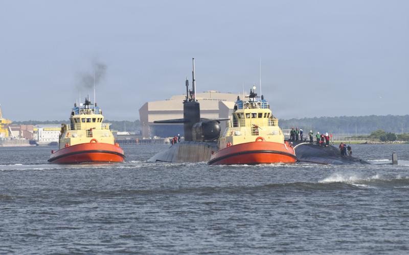 The Ohio-class guided-missile submarine USS Georgia transits the East River on Monday as she returns to her homeport at Naval Submarine Base Kings Bay.