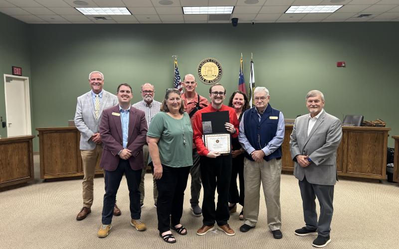 Dennis Irvin, sixth from left, was named the Camden County Board of Commissioners Employee of the Quarter. With Irwin, from left, are County Administrator Joey Yacobacci, Commissioner Cody Smith, Chairman Robbie Cheek, Human Resources generalist Amy Peeples, Commissioner Ben Casey, Dennis Irvin, Interim Deputy County Administrator Shannon Nettles, and Commissioners Jim Goodman and Martin Turner.