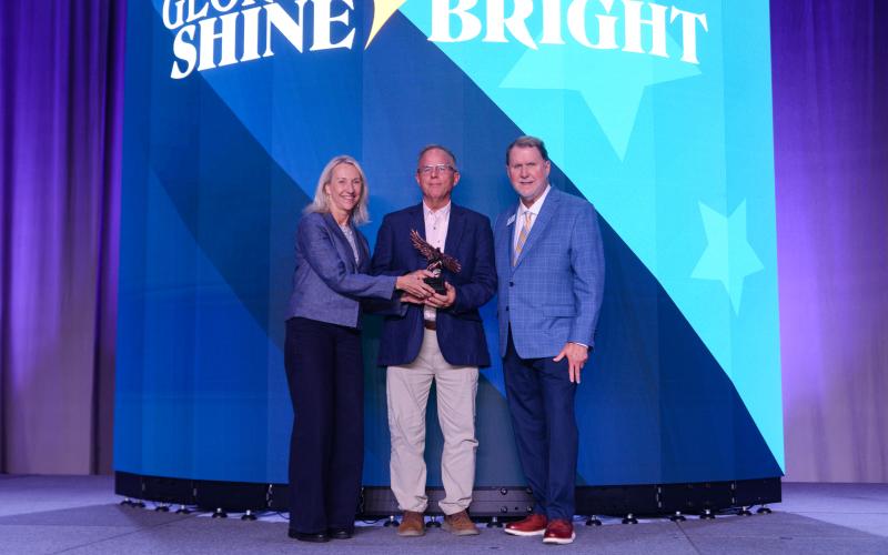 Camden County’s William “Bill” Gross, center, was recently honored with the Georgia Cities Foundation Renaissance Award at the Georgia Municipal Association’s Annual Convention in Savannah.