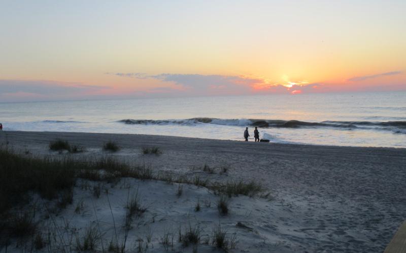 People were on the beach at sunrise when the city of Fernandina Beach reopened its shoreline Monday, May 4. Social distancing is required, but there are no restrictions on open hours or activities on the city’s beaches. Beachgoers were observed following the guidelines put in place to avoid spreading the novel coronavirus. Nassau County’s beaches from Peters Point to Amelia Island State Park are open from 6 a.m. until 9 p.m. daily with no group sports allowed. JULIA ROBERTS/NEWS-LEADER
